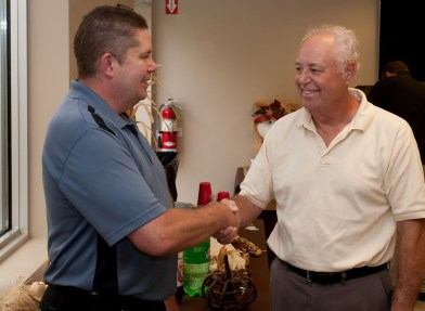 Bill Rosenberg, Sr. (right), founder of Columbia Chemical, congratulates Rick Holland at Rick's recent retirement party.