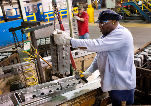 Quentin Wright, a General Motors Saginaw Metal Casting employee, working in the Saginaw, Mich., plant, which will receive a $215 million infusion for production of future engine block and head casting work. (Photo by John F. Martin for General Motors.)