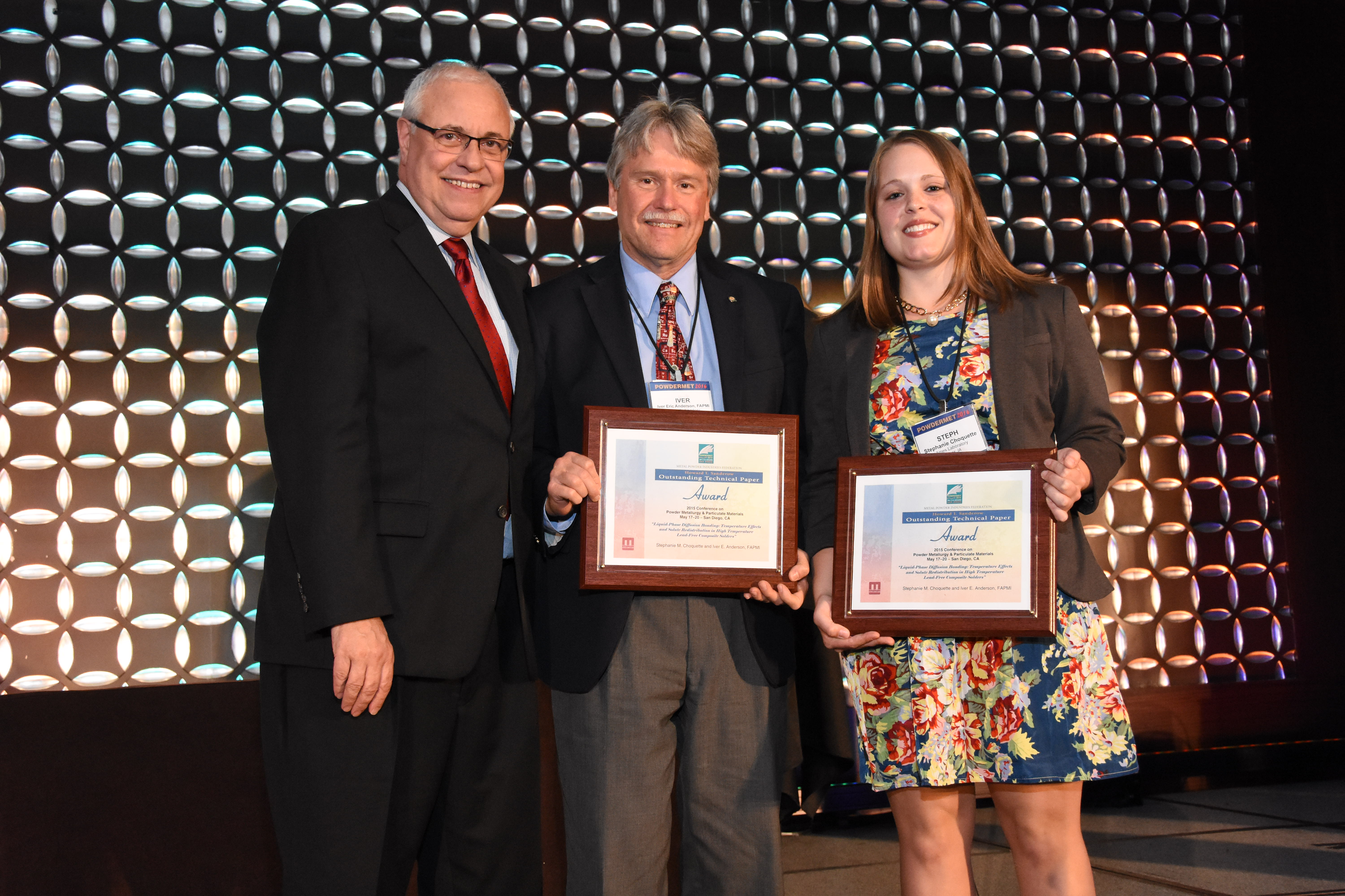 Stephanie M Choquette, graduate research assistant, and Iver E Anderson, FAPMI, senior metallurgist, Ames Laboratory, receiving the award.