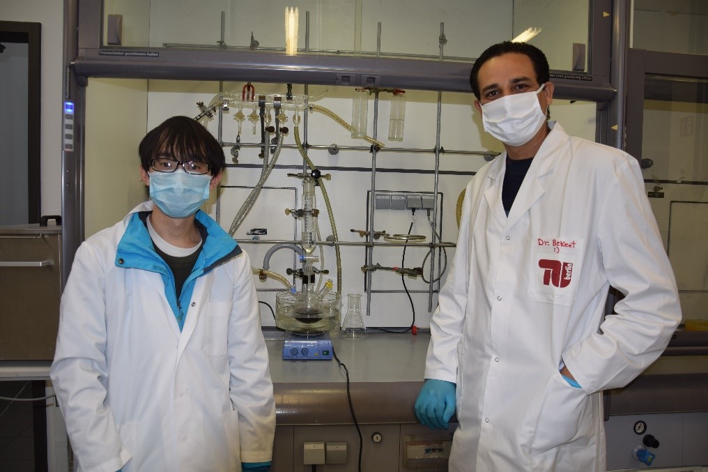 Maged Bekheet (right) with lead author Jun Wang beside the simple experimental apparatus used to produce the metal-ceramic nanocomposites. Photo by Haotian Yang (2020)