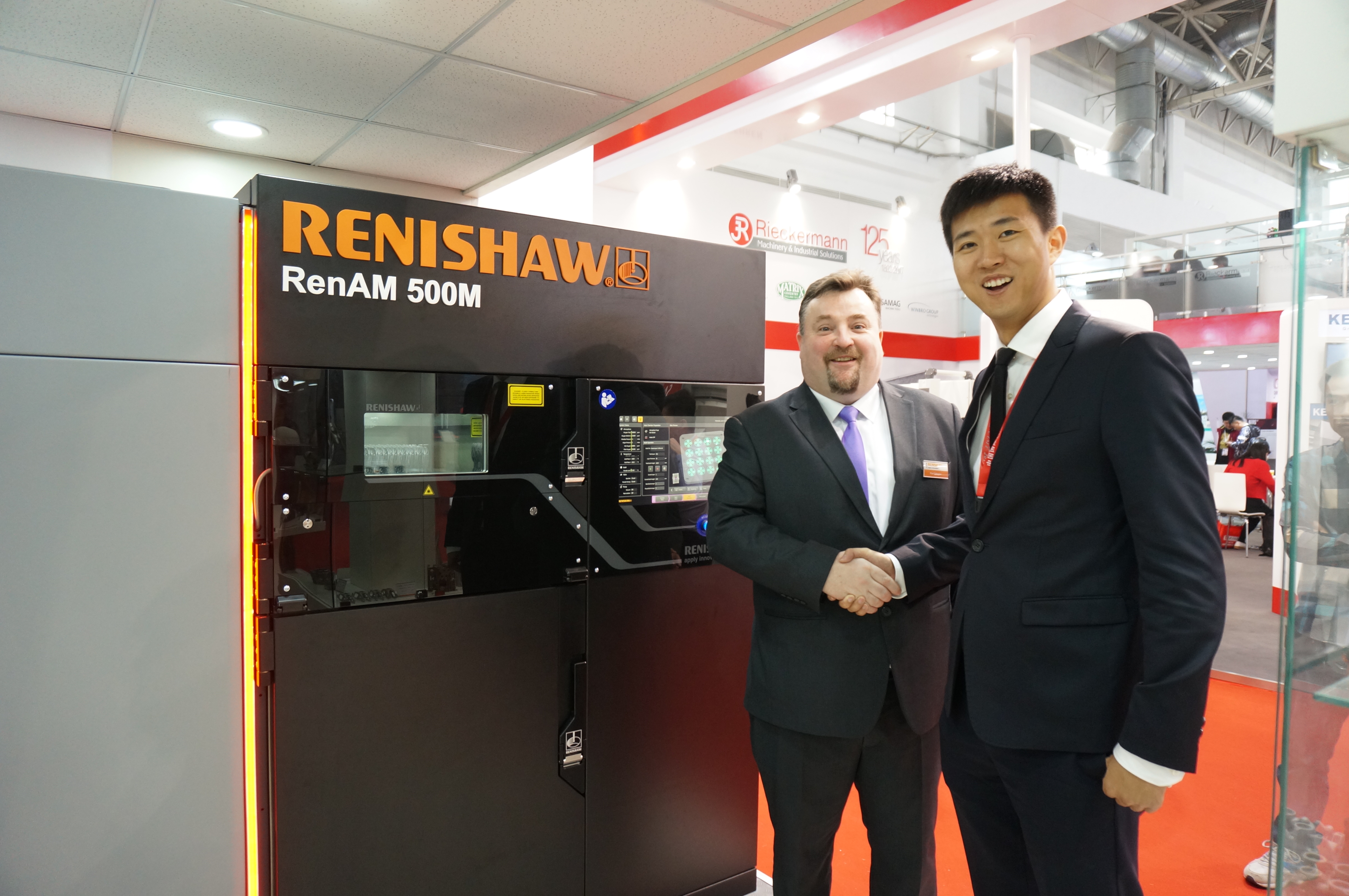 Shen Yu Lan, managing director of FalconTech Co Ltd (right) with Paul Gallagher, managing director/vice president of Renishaw (Hong Kong) Ltd.