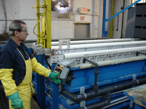 Experienced operators monitor each phase of the finishing process, including the triple-rinse stage.