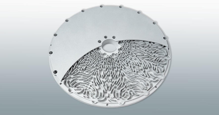 Additive manufacturing can help improve the performance and reliability of parts such as this silicon wafer table with conformal cooling channels and surface patterns.