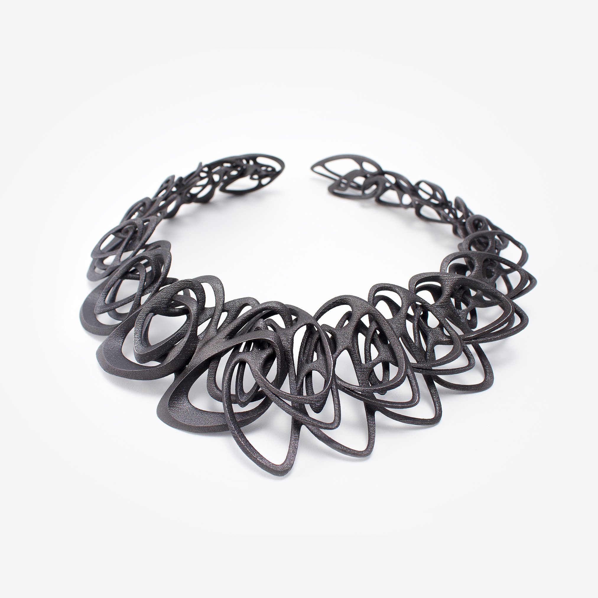 The necklace was 3D printed in steel using ExOne’s binder jetting technology.