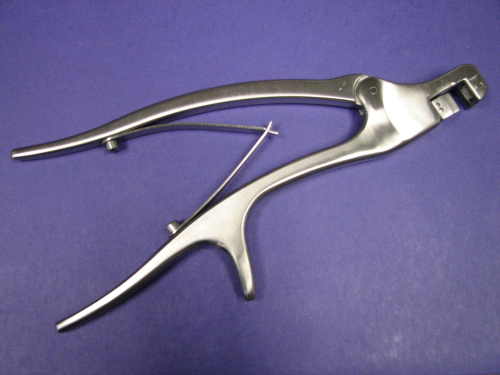 A prototype plate bender instrument, used in spinal surgery.