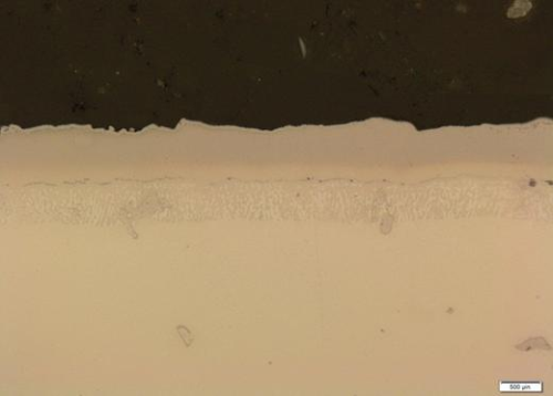 Figure 1.  Metallographic micrograph of typical Pre-mixed powder aluminide coating.