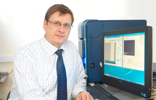 Hardide Coatings technical director Dr Yuri Zhuk with the Scanning Electron Microscope (SEM).