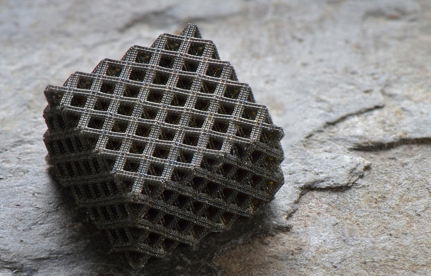 This photo shows an example of the hierarchical metallic metamaterials produced by a novel 3D printing process; these metamaterials possess multi-layered, fractal-like 3D architectures that incorporate nanoscale features. Photo: Jim Stroup/Virginia Tech.