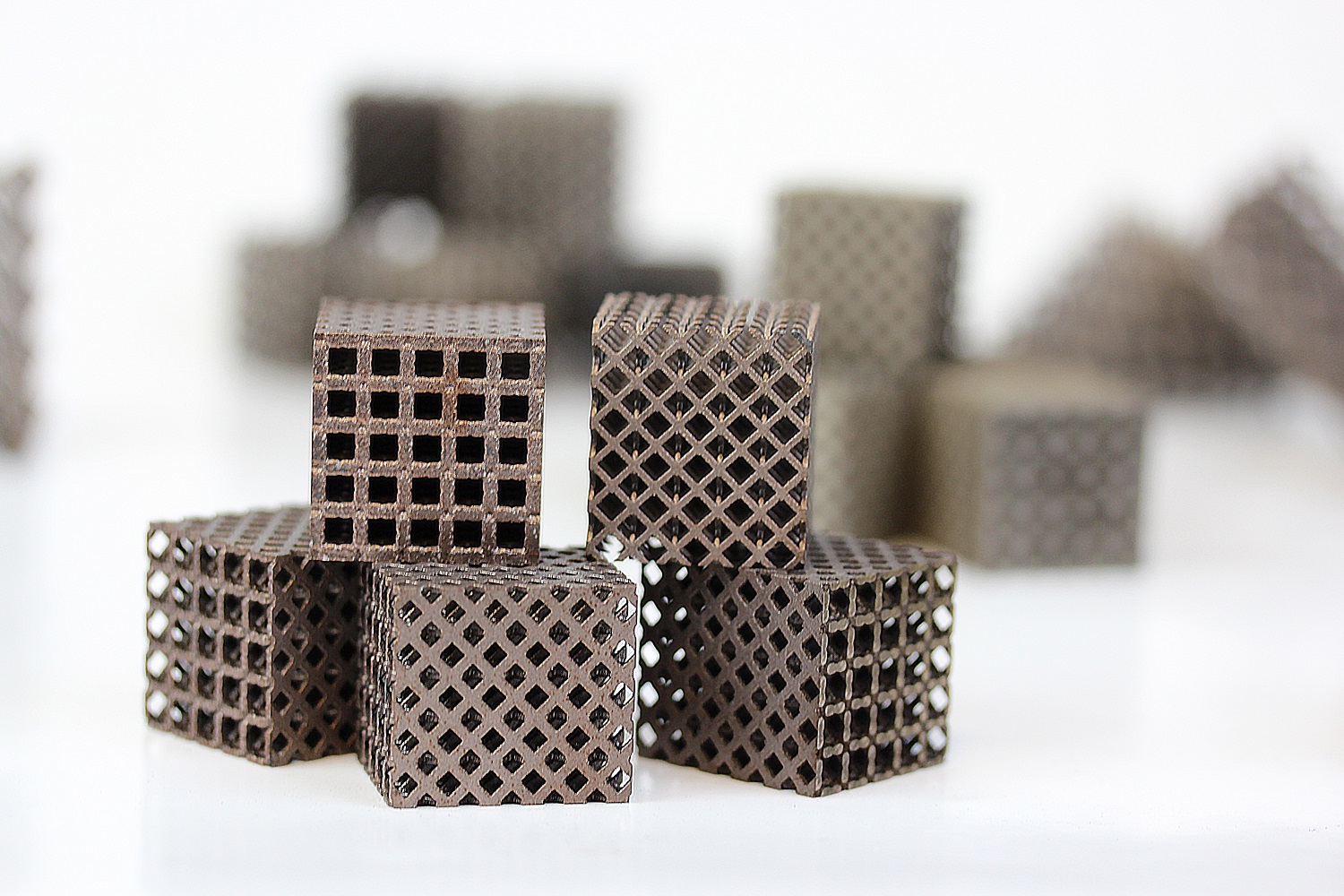 LIGHT has investigated the use of novel low-density lattice structures to support overhanging geometries and prevent deformation during printing.